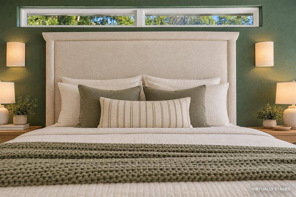 With its own entrance onto the spacious back patio, this primary suite is a true relaxing retreat.
