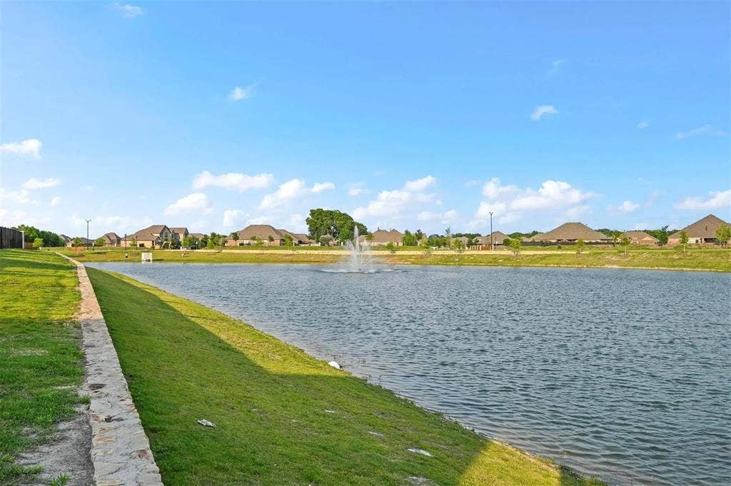602 Brock Drive, Anna, TX 75409 Expansive body of water featuring a central fountain
