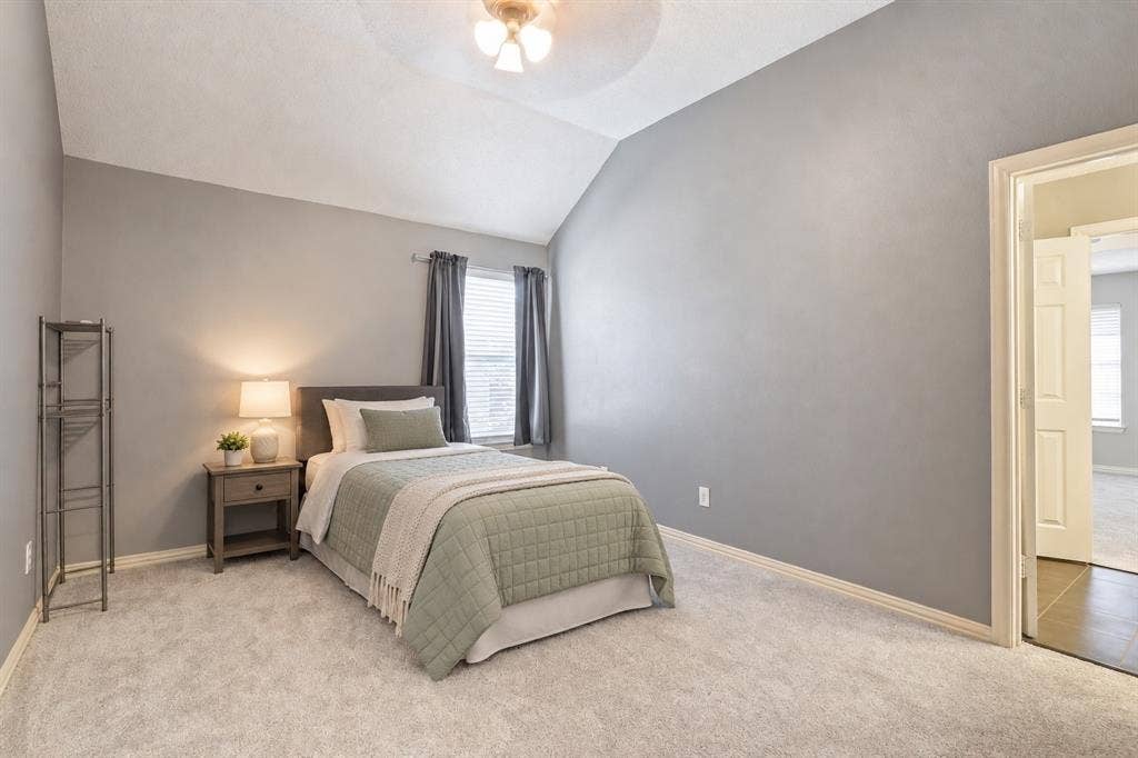 Vaulted ceiling, neutral wall tones, ( virtually Staged)