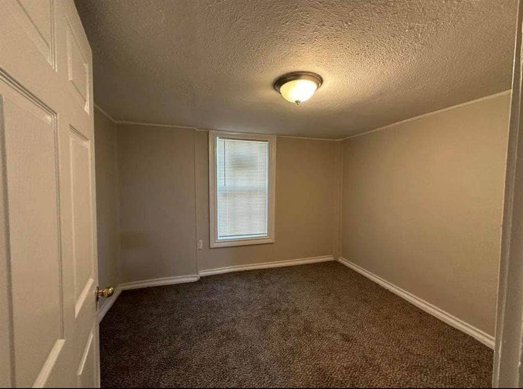 901 Davis Street, Grand Prairie, TX 75050 Bedroom 2 downstairs unit