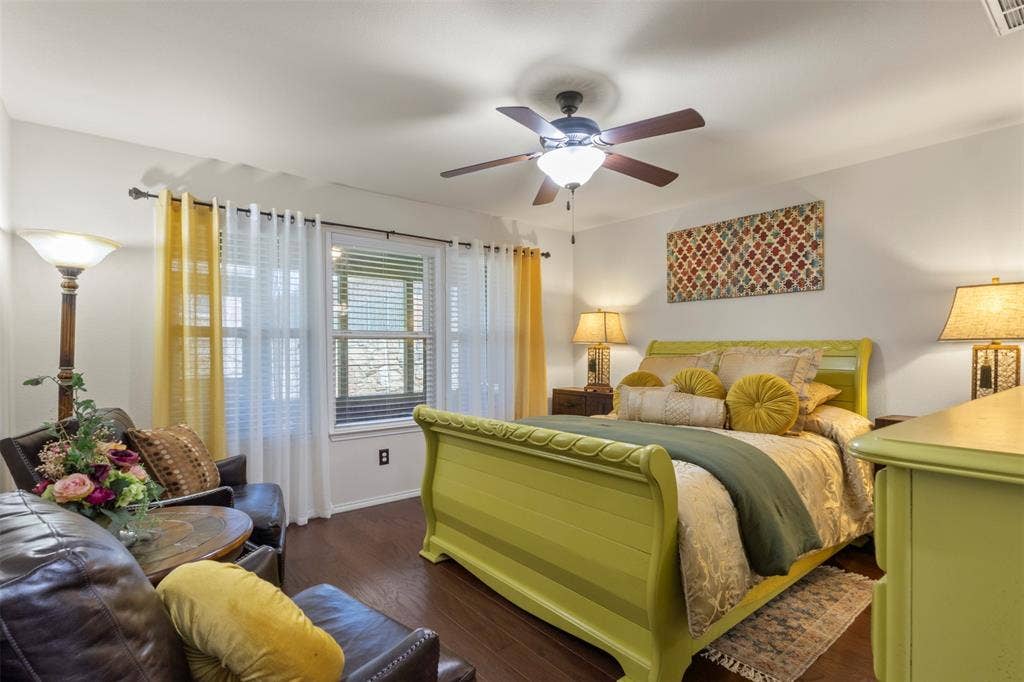 146 Montague Lane, Frisco, TX 75036 Wood-finish flooring, ceiling fan with integrated lighting, dual windows, and white walls