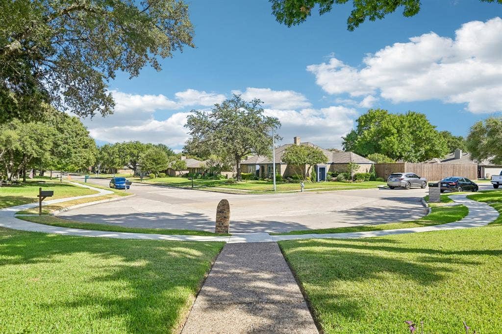 3441 Sheffield Circle, Plano, TX 75075 Landscaped front yard with mature trees