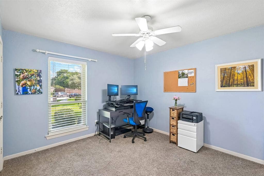 3441 Sheffield Circle, Plano, TX 75075 Recessed window with blinds, ceiling fan with light fixture, and carpet flooring