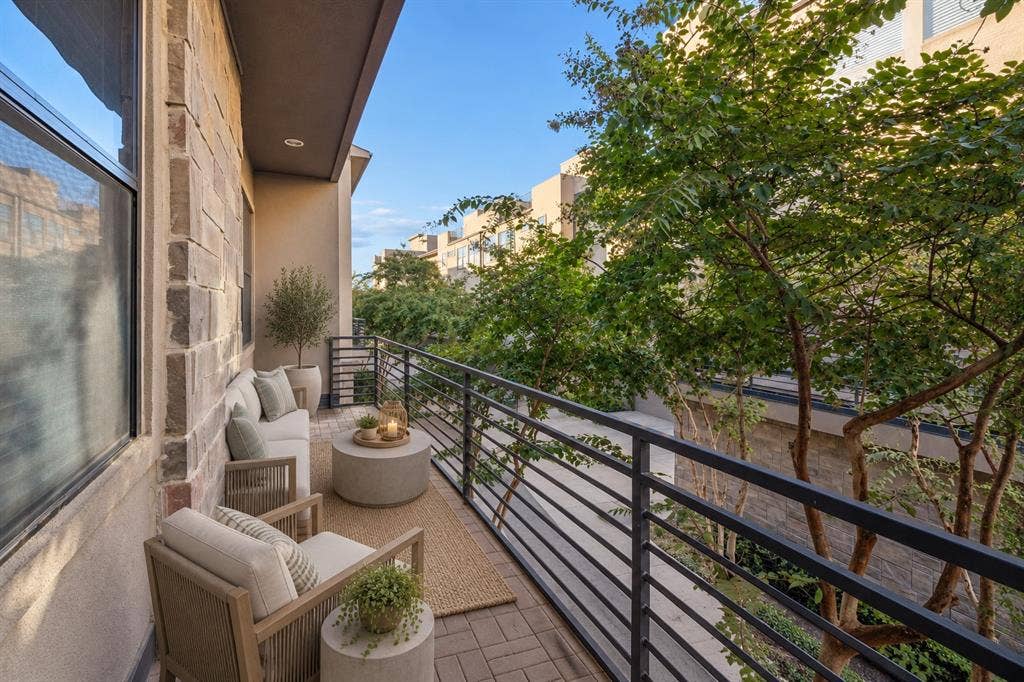1801 Annex Avenue, #402, Dallas, TX 75204 Balcony off of main level virtually staged