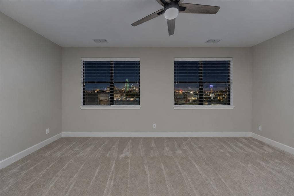 1801 Annex Avenue, #402, Dallas, TX 75204 Primary bedroom with skyline view