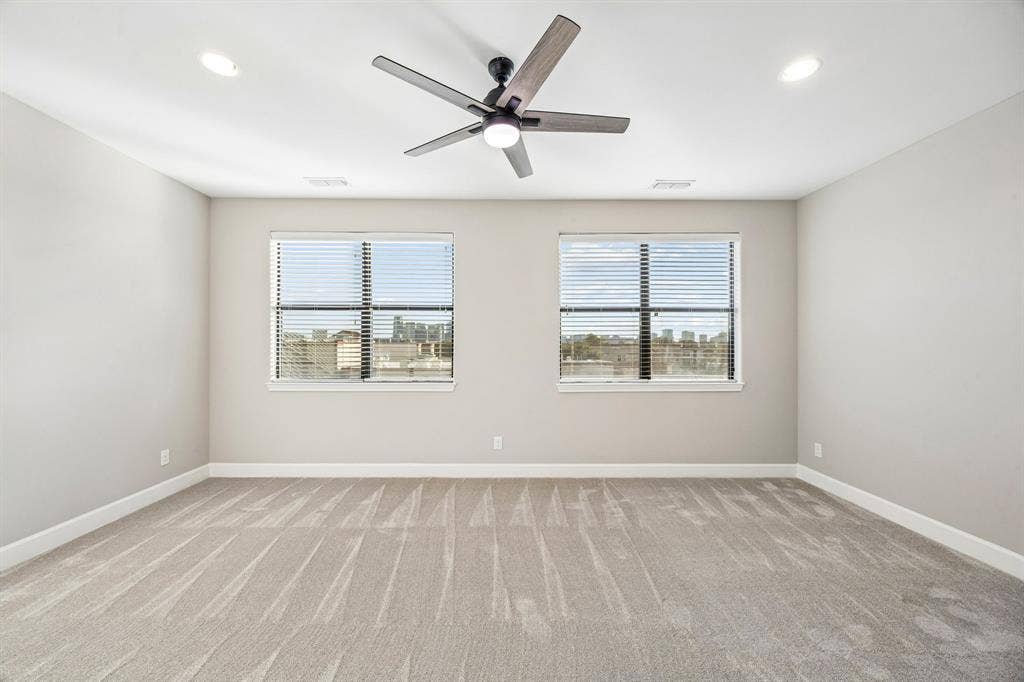 1801 Annex Avenue, #402, Dallas, TX 75204 Primary bedroom with unobstructed skyline view.