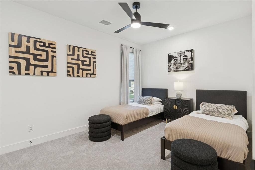 1117 Bradford Street, Celina, TX 75009 Spacious room featuring light gray carpeting, crisp white walls, a contemporary ceiling fan, and window with natural light