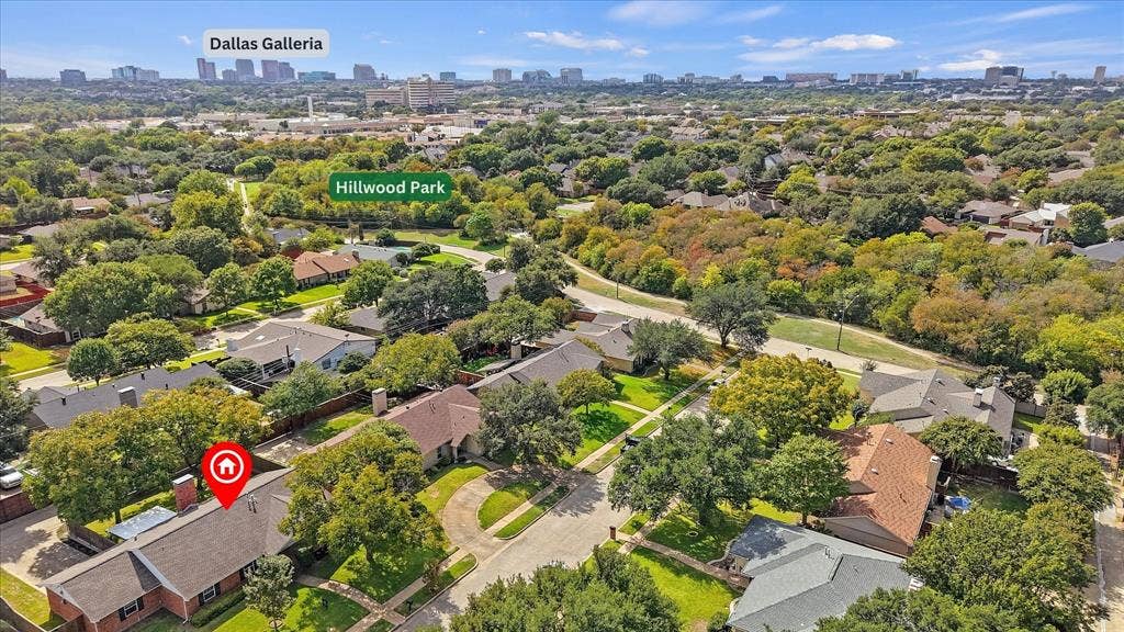 Aerial perspective featuring mature canopy trees, nearby walking trail and just a short drive to Dallas Galleria.