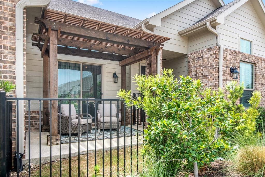 2644 Chardonnay Court, Grand Prairie, TX 75054 Private patio with a wood pergola, concrete flooring, and sliding glass door access