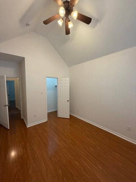 500 Leatherman Drive, Saginaw, TX 76179 Vaulted ceiling, wood-finish flooring, ceiling fan with integrated lighting, and white paneled doors