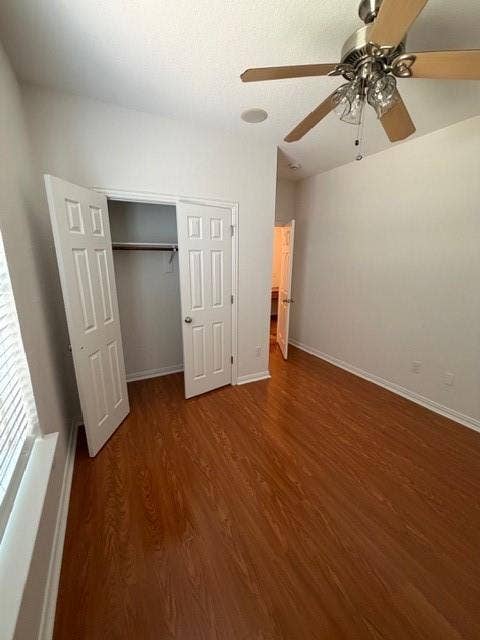 500 Leatherman Drive, Saginaw, TX 76179 Wood-finish flooring, ceiling fan with integrated lighting, recessed ceiling speaker, bi-fold closet doors, and window with blinds