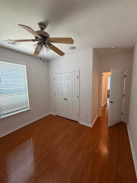 500 Leatherman Drive, Saginaw, TX 76179 Wood-finish flooring, ceiling fan with light kit, double-door closet, recessed lighting, and window with horizontal blinds