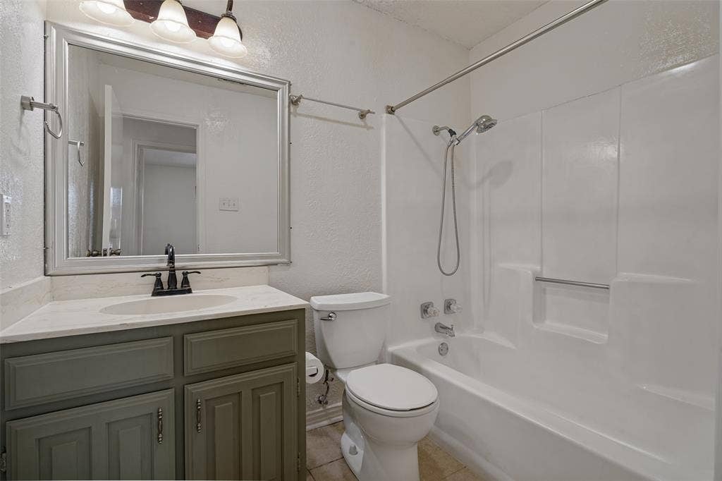 6527 Leasa Court, Sachse, TX 75048 Hall Bathroom conveniently located by bath 2 and 3.