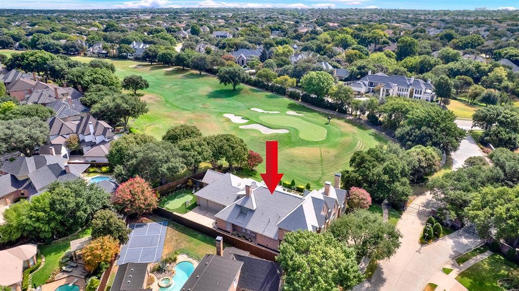 5325 BLAKE Drive, Plano, TX 75093 This wide panorama captures the estate’s prime location, showing the entire community of custom homes nestled along the manicured fairways and bunkers of the championship Gleneagles Queens course. Imagine waking up to these endless green vistas and enjoying easy access to the clubhouse right from your neighborhood streets.