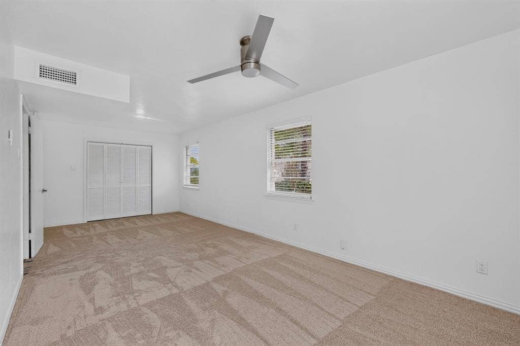 2942 Candlewick Lane, Farmers Branch, TX 75234 Primary Bedroom with ceiling fan