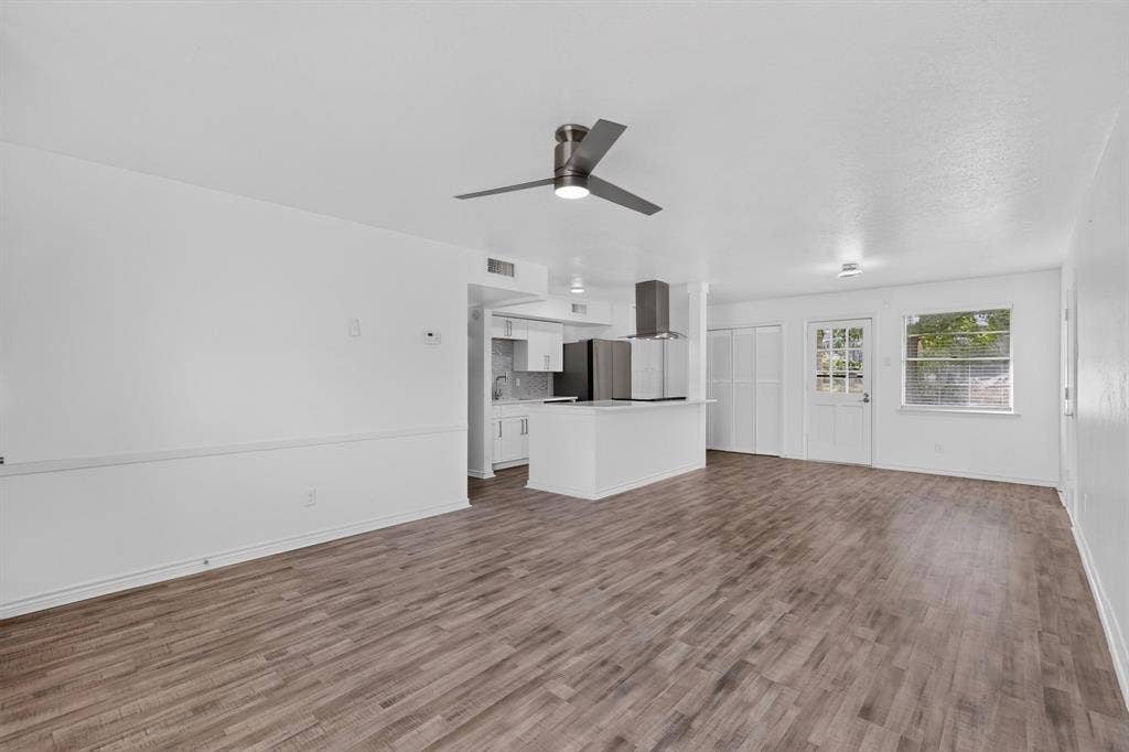 2942 Candlewick Lane, Farmers Branch, TX 75234 Living Room open to Dining Area & Kitchen