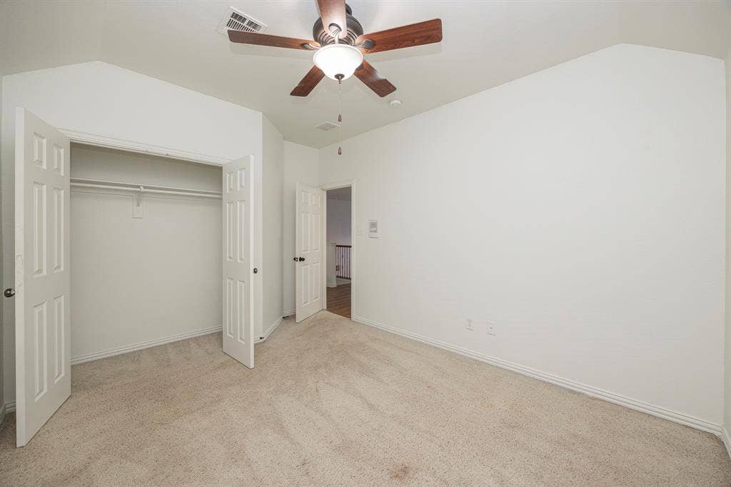 6405 Sapphire Drive, McKinney, TX 75070 Plush carpeting and white painted walls