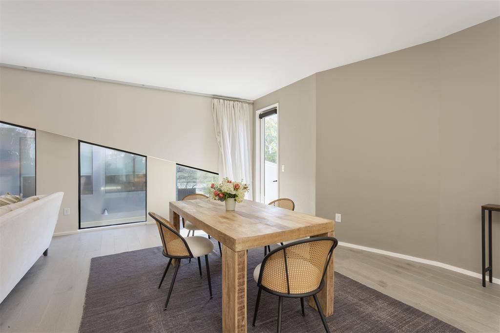 Dining area featuring baseboards and light wood finished floors