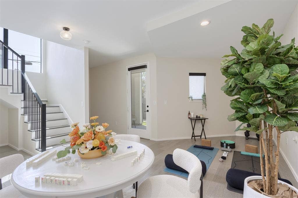 Dining area featuring stairs and recessed lighting