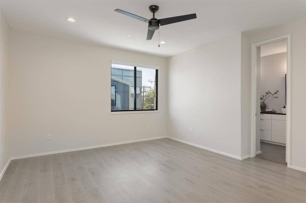 Spare room featuring recessed lighting, light wood-style floors, and a ceiling fan