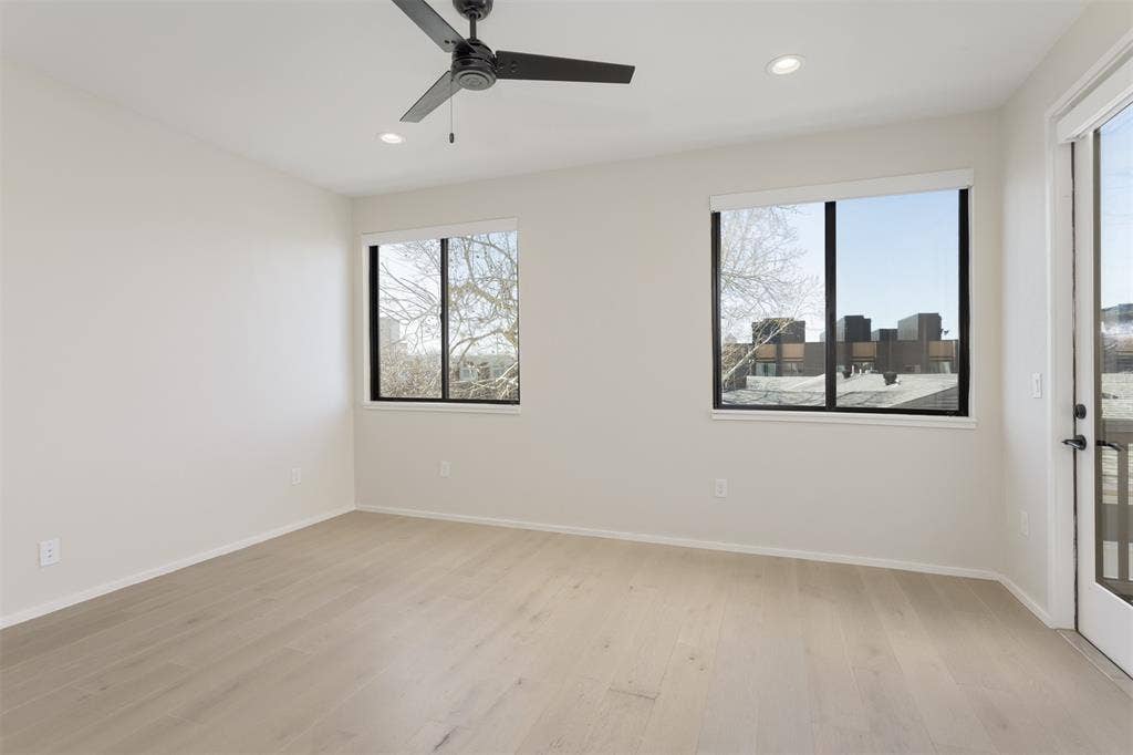 Unfurnished room with light wood-type flooring, recessed lighting, and ceiling fan