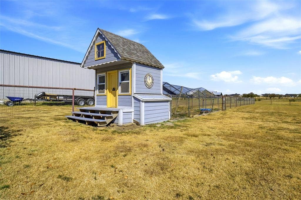 Chicken coop that could be changed back to a playhouse.