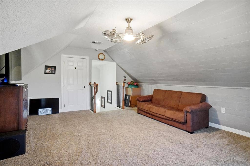 2nd living room upstairs or could be used as a media room.