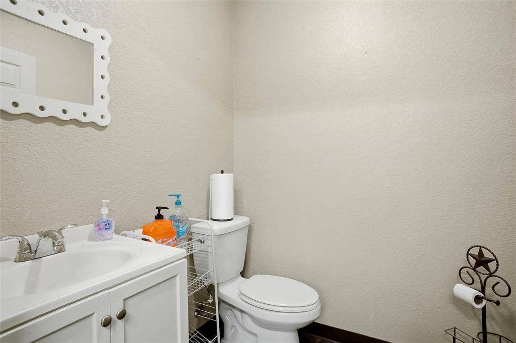 Half bathroom in the living quarters of the shop.