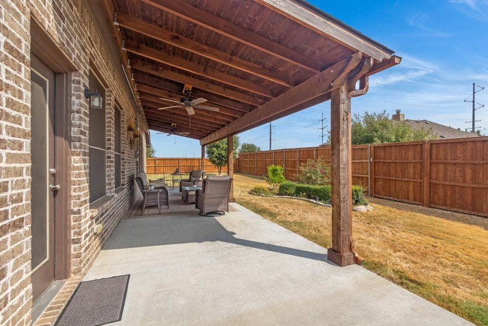 3712 Ann Arbor Lane, Denton, TX 76207 Enjoy spending time on this large, covered patio with ceiling fans as well as wiring for a hot tub already in place!