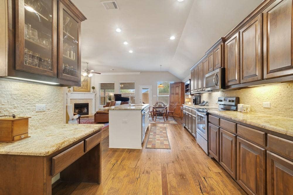 3712 Ann Arbor Lane, Denton, TX 76207 Keep life organized with this built in desk area perfect for researching new recipes to try out!