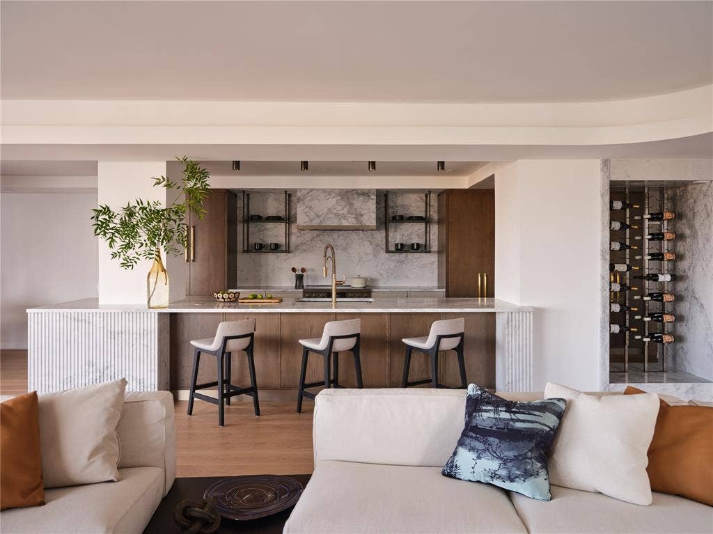 3310 Fairmount Street, #P3B, Dallas, TX 75201 Chef's kitchen details include rift-cut white oak cabinetry with Arabesque marble and a wine feature wall.