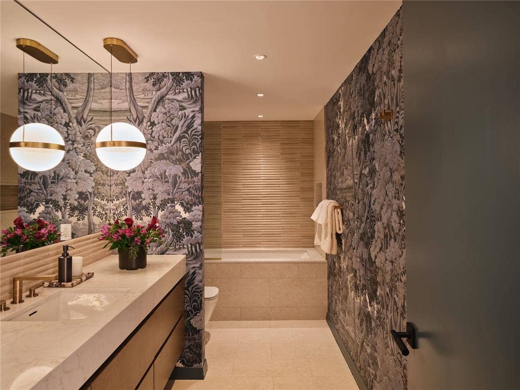 3310 Fairmount Street, #P3B, Dallas, TX 75201 Guest bath with House of Hackney wallpaper and brushed bronze Kohler fixtures