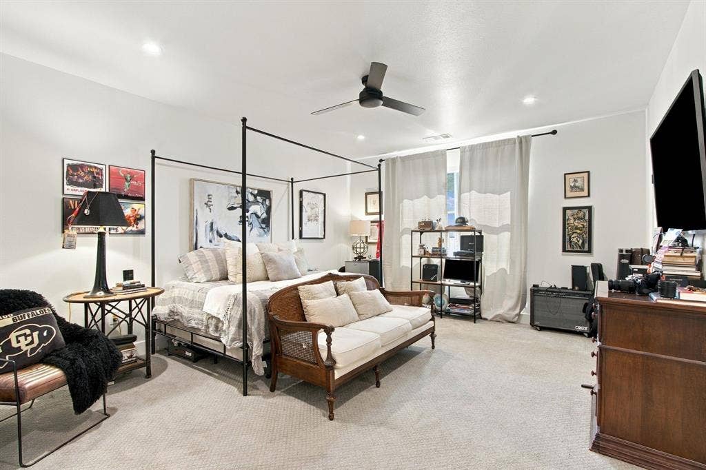 46 Crown Place, Richardson, TX 75080 Recessed lighting, ceiling fan, carpeting, and window with light-filtering drapery