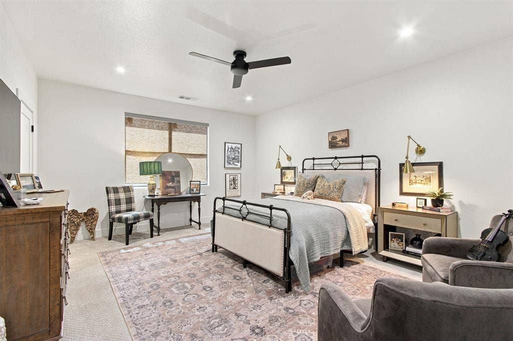 46 Crown Place, Richardson, TX 75080 Recessed lighting, ceiling fan, and window with roller shade