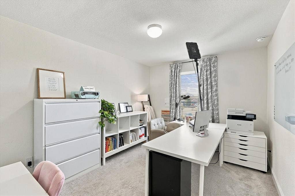 Bedrrom with large walk in closet currently being used as an office