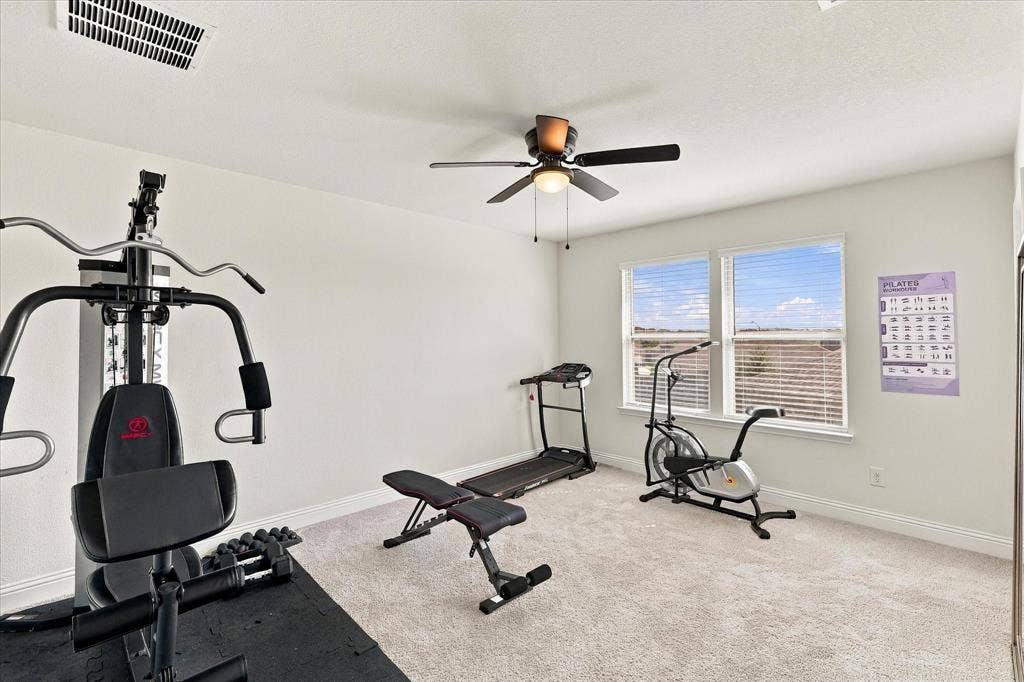 Huge bedroom with large walk in closet currently being used for a work out room