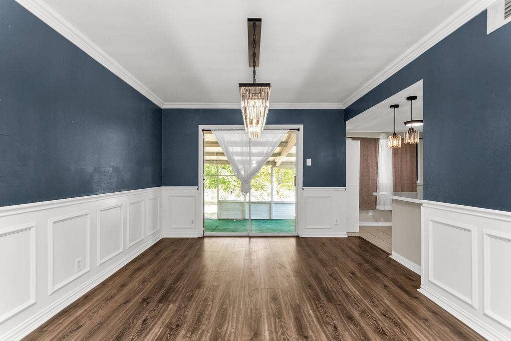 2914 Harvard Street N, Irving, TX 75062 Wood-finish flooring with wainscoting and crown molding