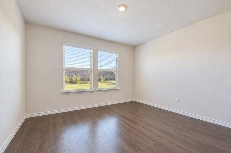 339 Exploration Way, Fate, TX 75189 Wood-finish flooring, recessed ceiling light, dual windows with blinds, and white wall finishes