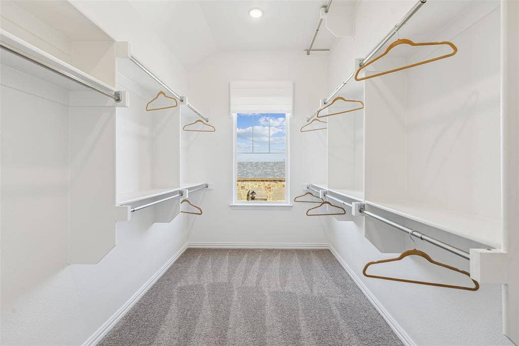 9735 Speaker Drive, Frisco, TX 75035 With seasonal hanging racks and plenty of room, there'll be no fighting over closet space in this outstanding home.