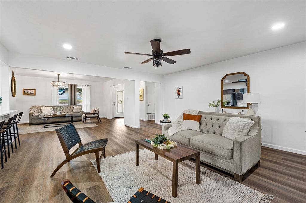 1132 Western Oaks Drive, Woodway, TX 76712 Wood-finish flooring, recessed lighting, and a ceiling fan with integrated light