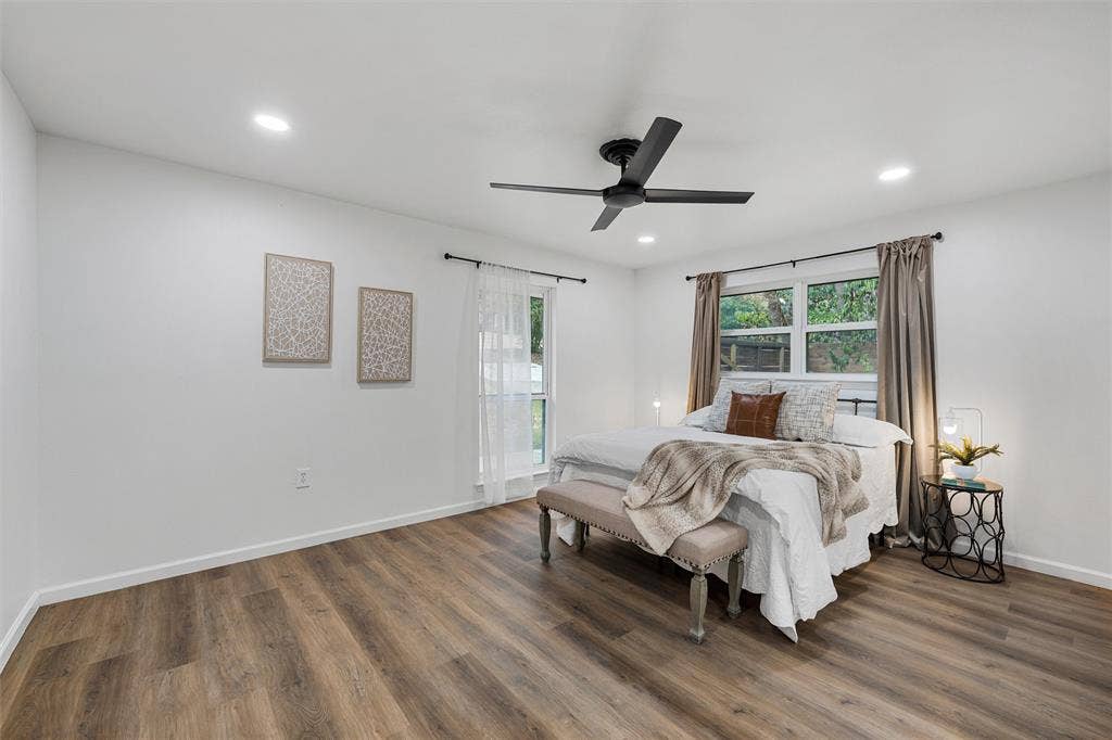 1132 Western Oaks Drive, Woodway, TX 76712 Wood-finish flooring, recessed lighting, and a contemporary ceiling fan