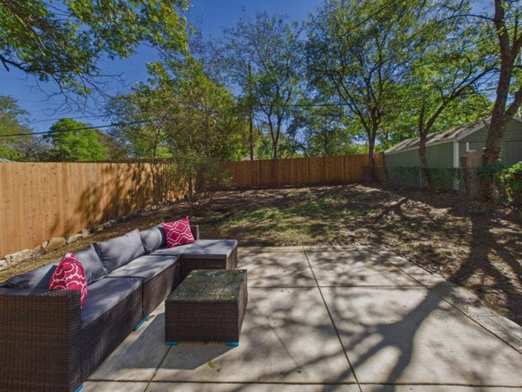 510 S Westmoreland Road, Dallas, TX 75211 Expansive concrete patio with a new wood privacy fence