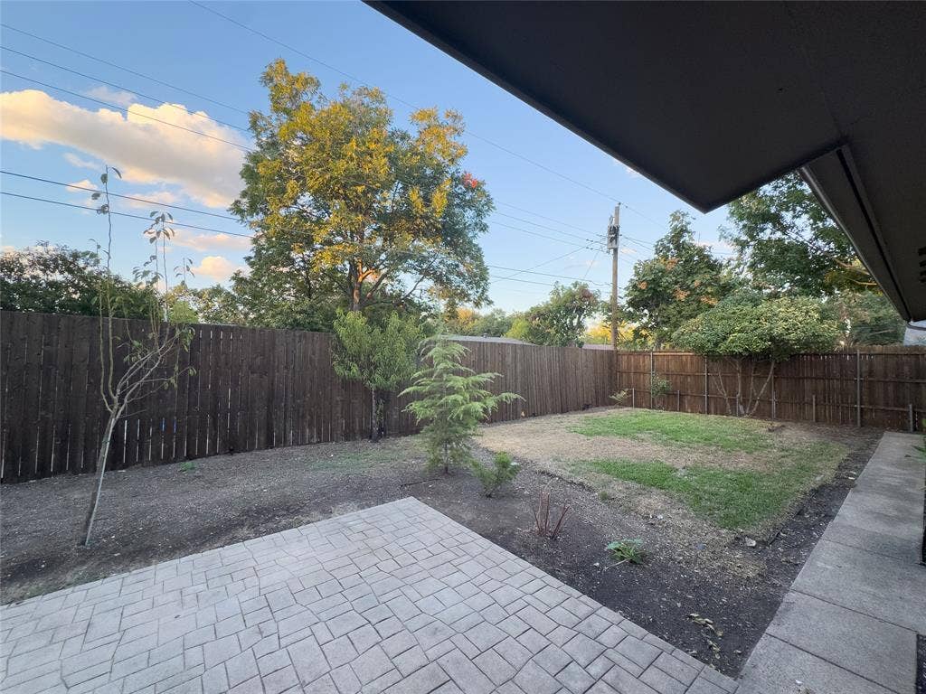 818 Fontana Avenue, Richardson, TX 75080 sod and rock will be added once weather cools down