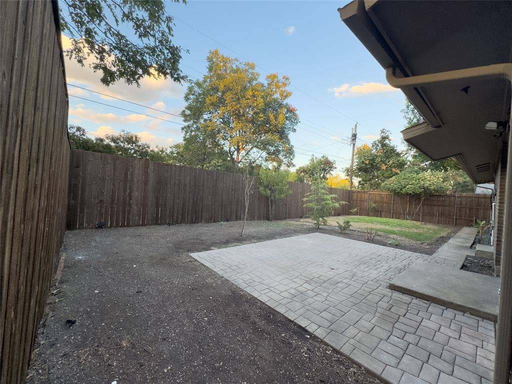 818 Fontana Avenue, Richardson, TX 75080 sod and rock will be added once weather cools down
