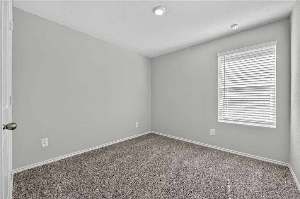 5413 Flannel Lane, Denton, TX 76249 Recessed lighting, neutral wall paint, window with blinds, carpeted flooring, and baseboard trim