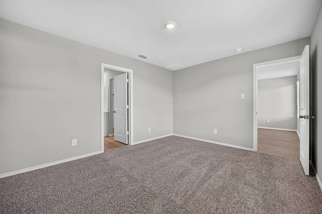 5413 Flannel Lane, Denton, TX 76249 Plush carpet flooring, neutral paint palette, recessed ceiling lighting, and white trim