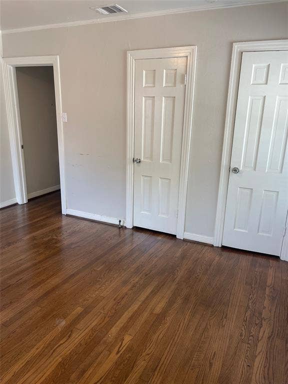 1527 Harbor Road, #1527, Dallas, TX 75216 Hardwood flooring, painted interior walls, white trim, and panel doors