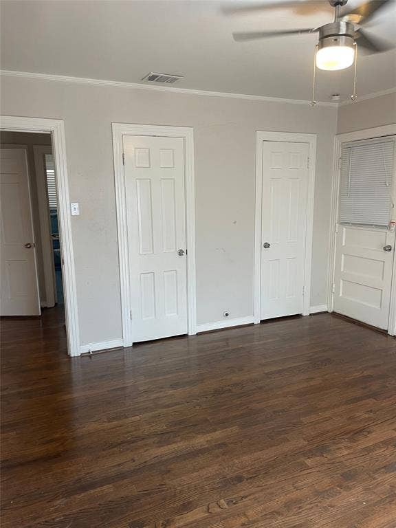 1527 Harbor Road, #1527, Dallas, TX 75216 Hardwood-style flooring, contemporary ceiling fan with integrated lighting, white trim, and multiple panel doors