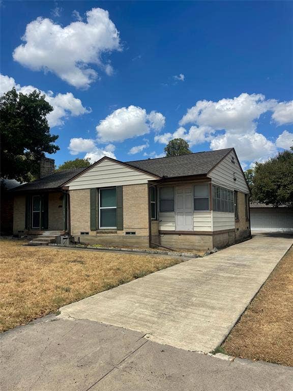 1527 Harbor Road, #1527, Dallas, TX 75216 Brick exterior with a gabled roof