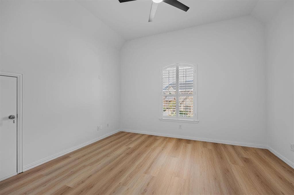 5960 Indigo Sky Drive, Frisco, TX 75036 Bedroom 4 with brand new LVP flooring.